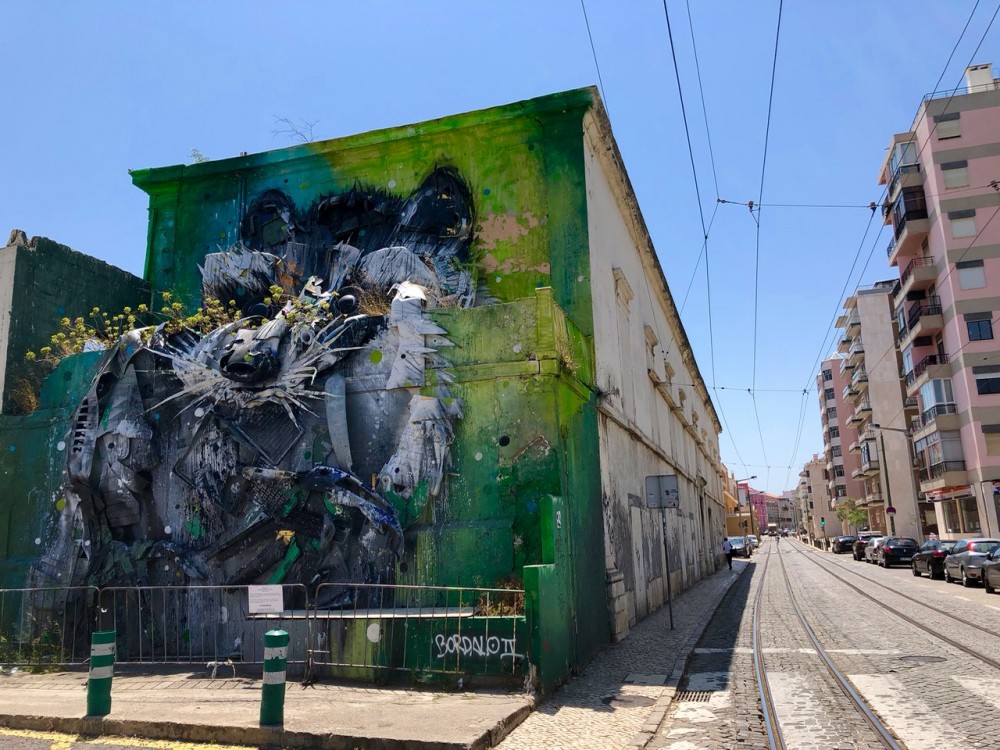 One of Bordalo II’s Trash Animals in Lisbon - Passports and Spice