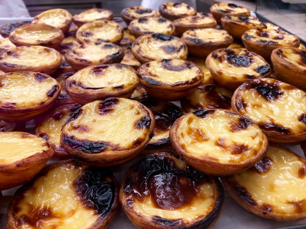 Pastel de nata are Lisbon's most famous pastries - Passports and Spice